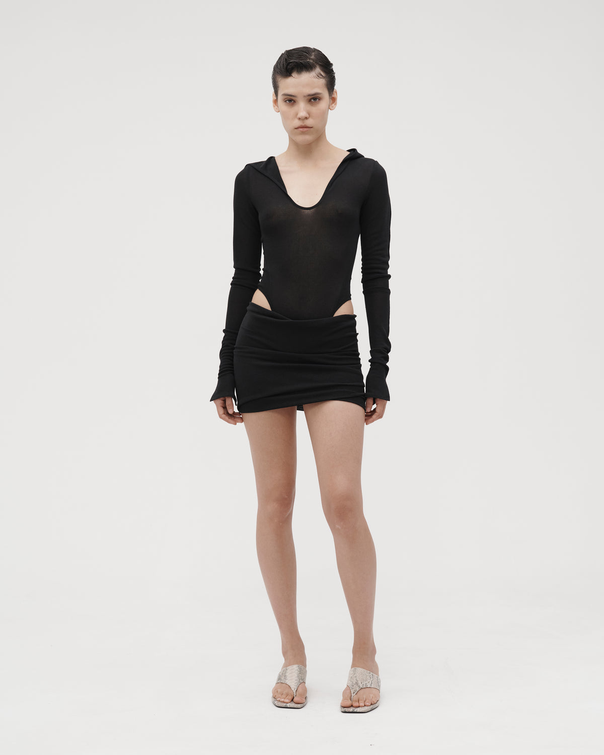 TWISTED MINI SKIRT IN BLACK