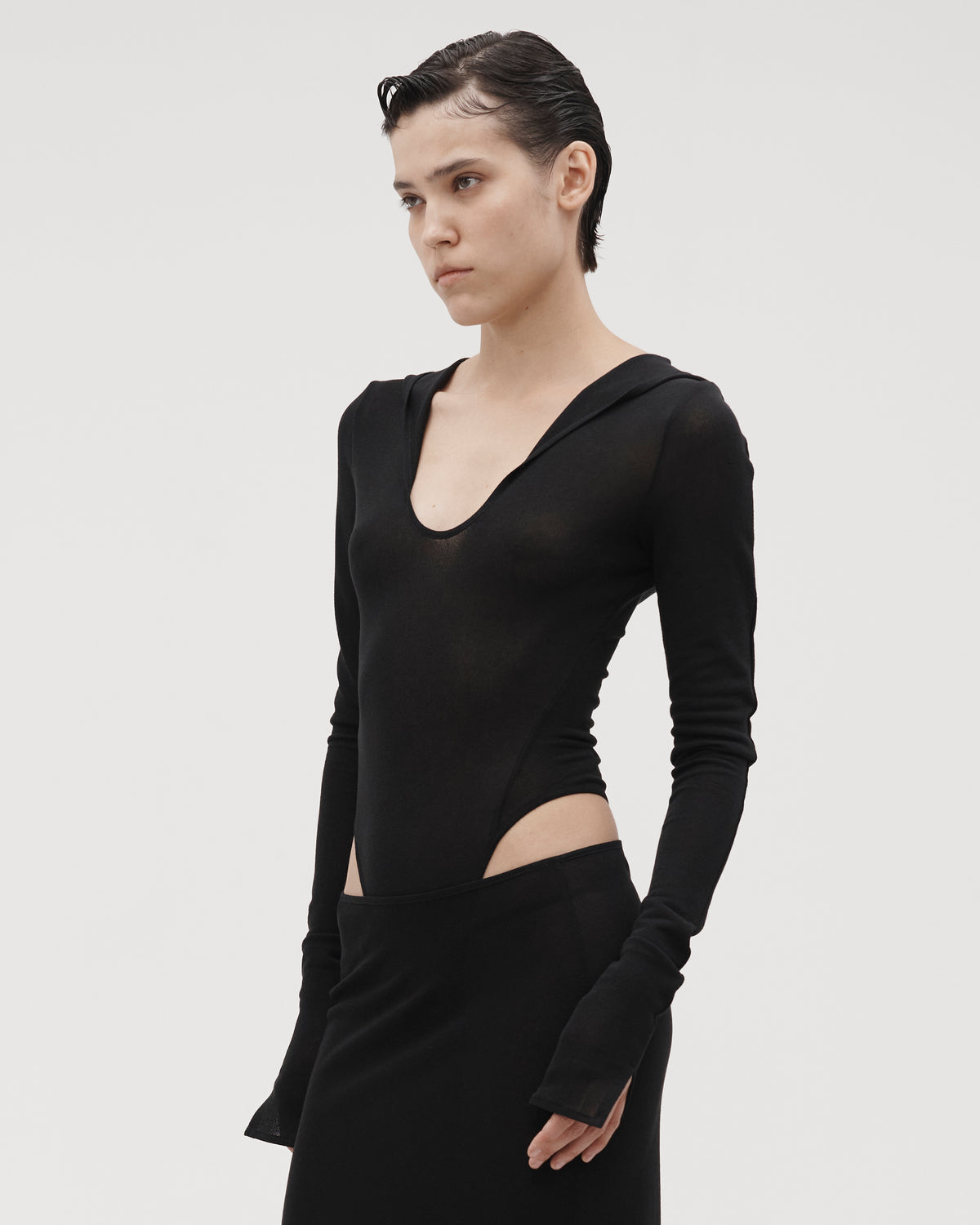 HOODED BODYSUIT IN BLACK