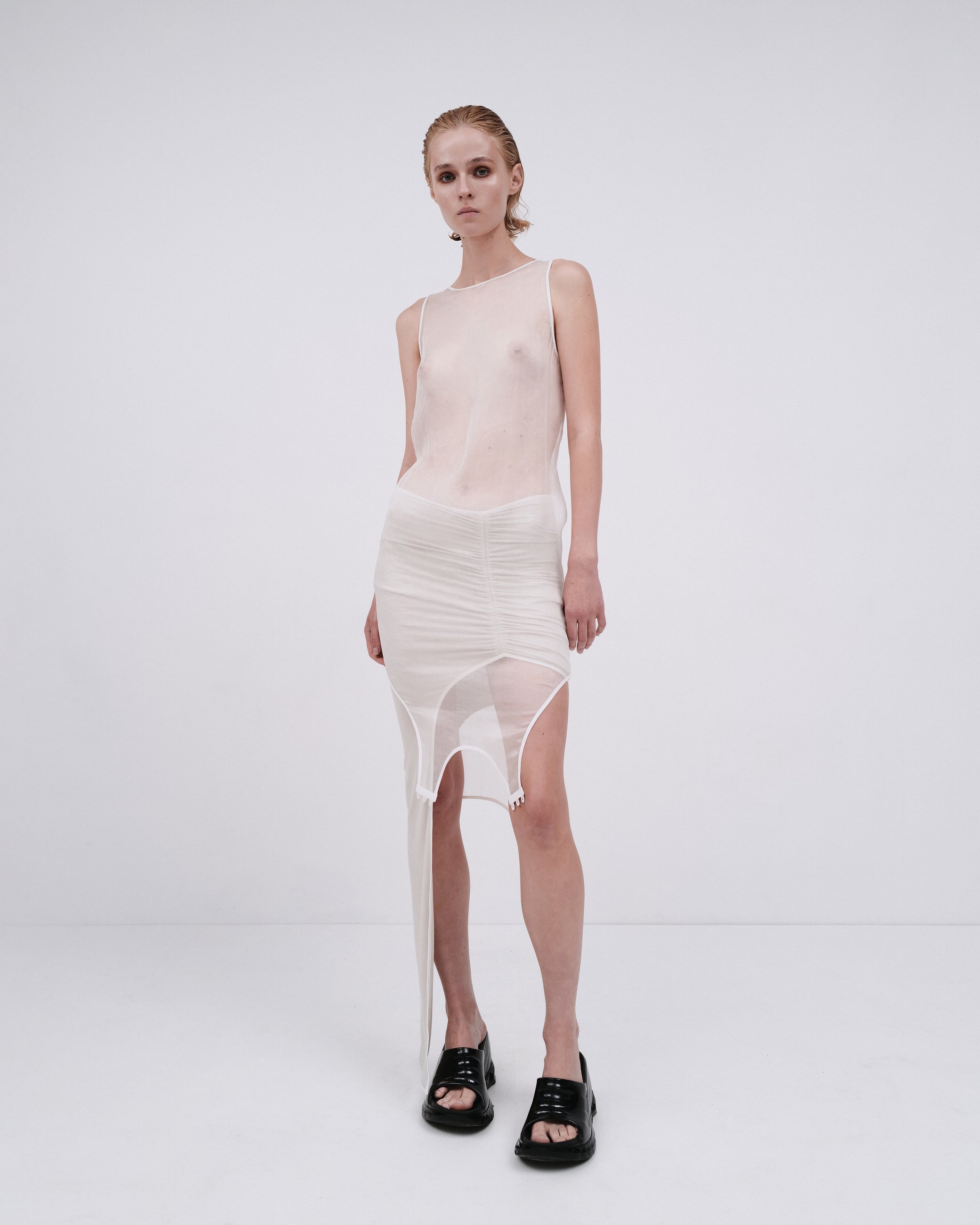 DRAPED SKIRT WITH ELONGATED DETAIL IN PEARL