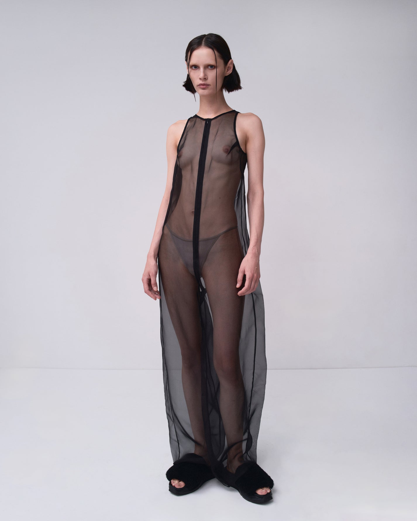 TRANSPARENT JUMPSUIT IN BLACK