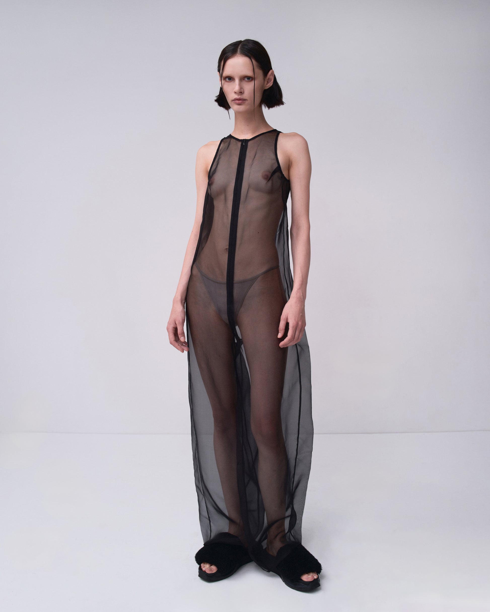 TRANSPARENT JUMPSUIT IN BLACK