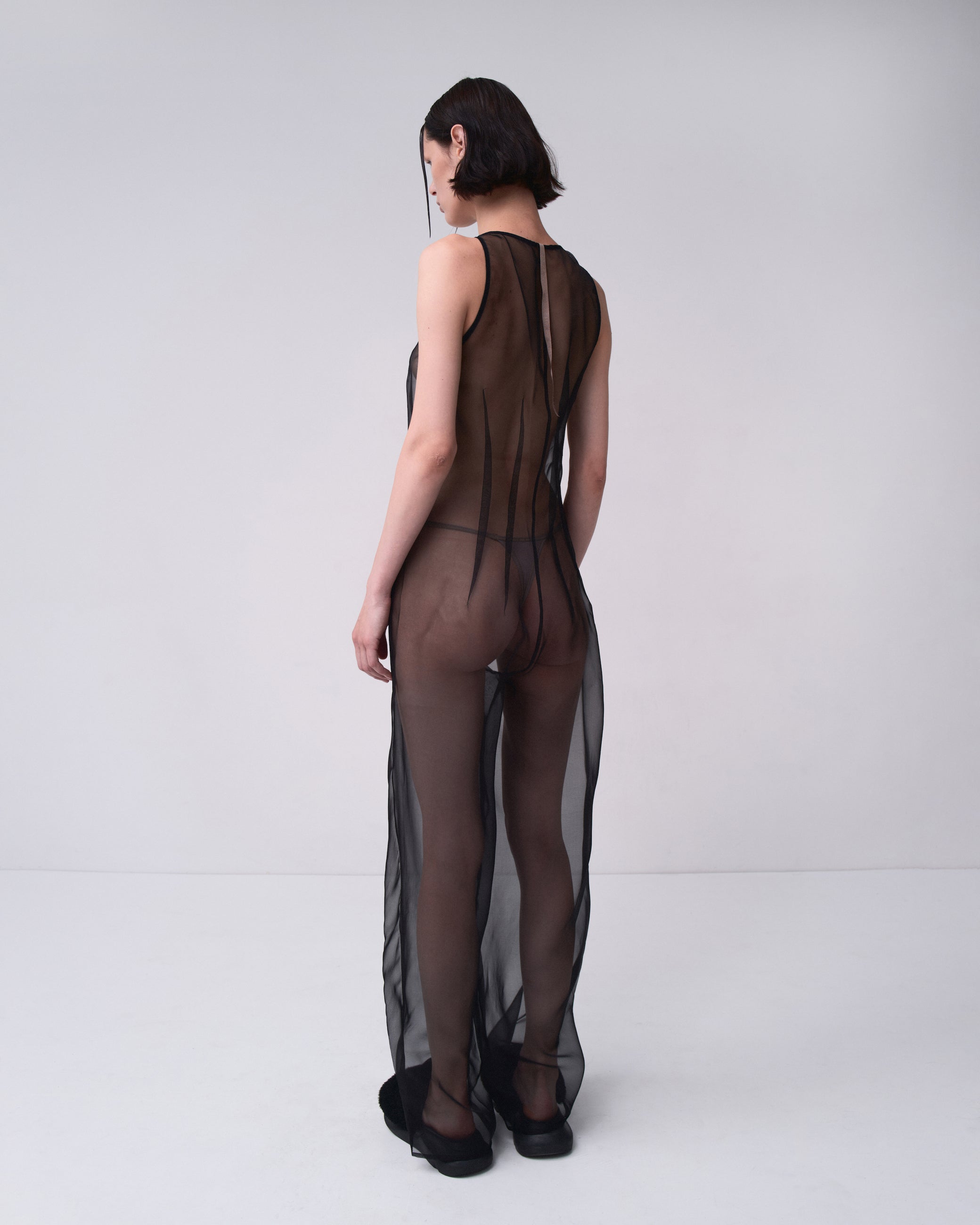 TRANSPARENT JUMPSUIT IN BLACK