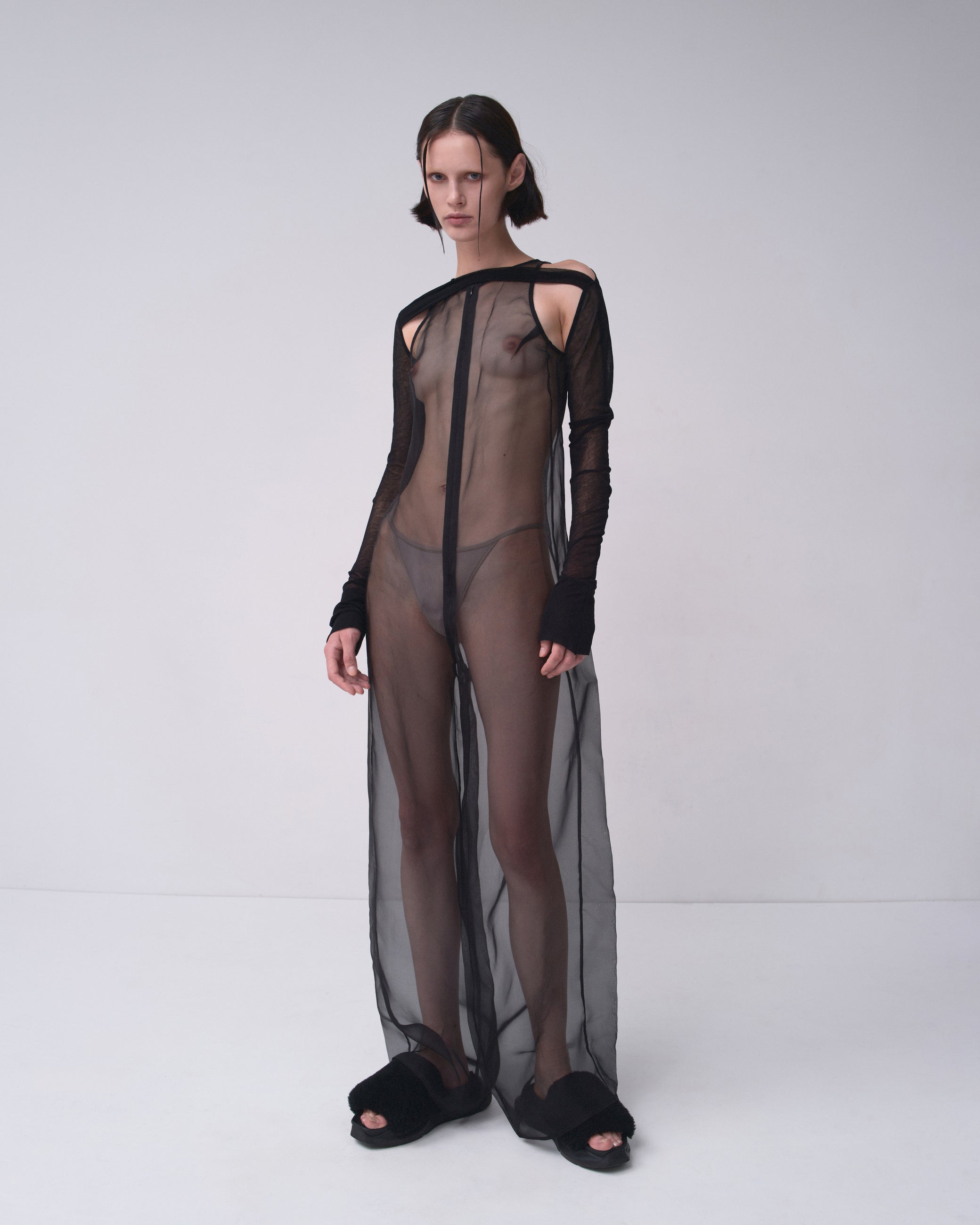 TRANSPARENT JUMPSUIT IN BLACK