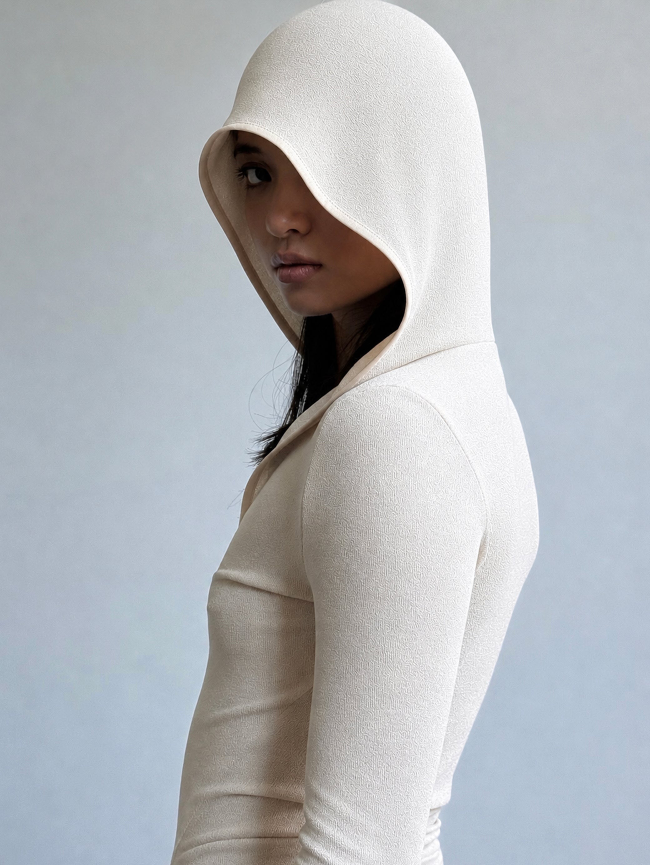 HOODED BODYSUIT IN BEIGE