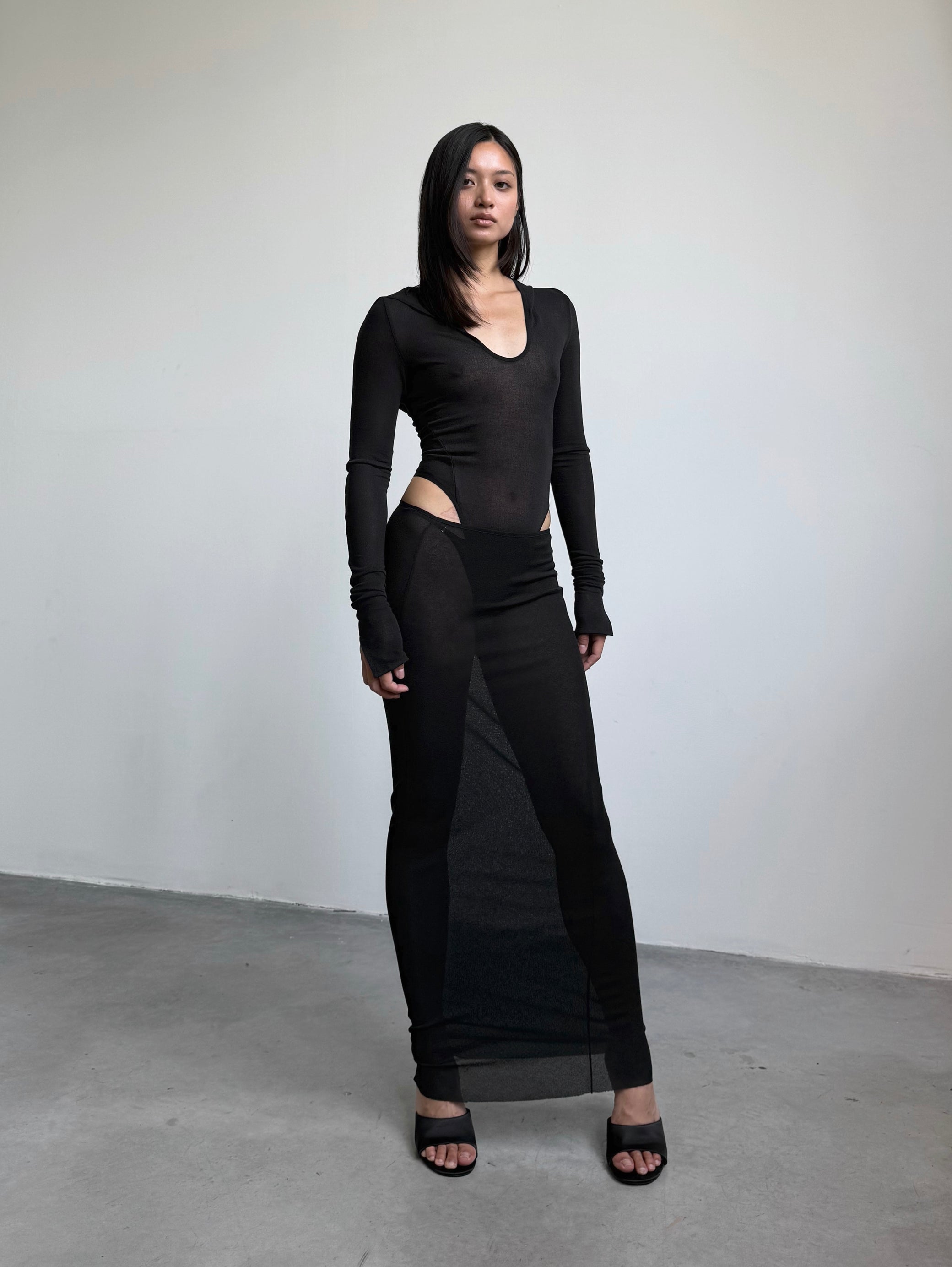 HOODED BODYSUIT IN BLACK