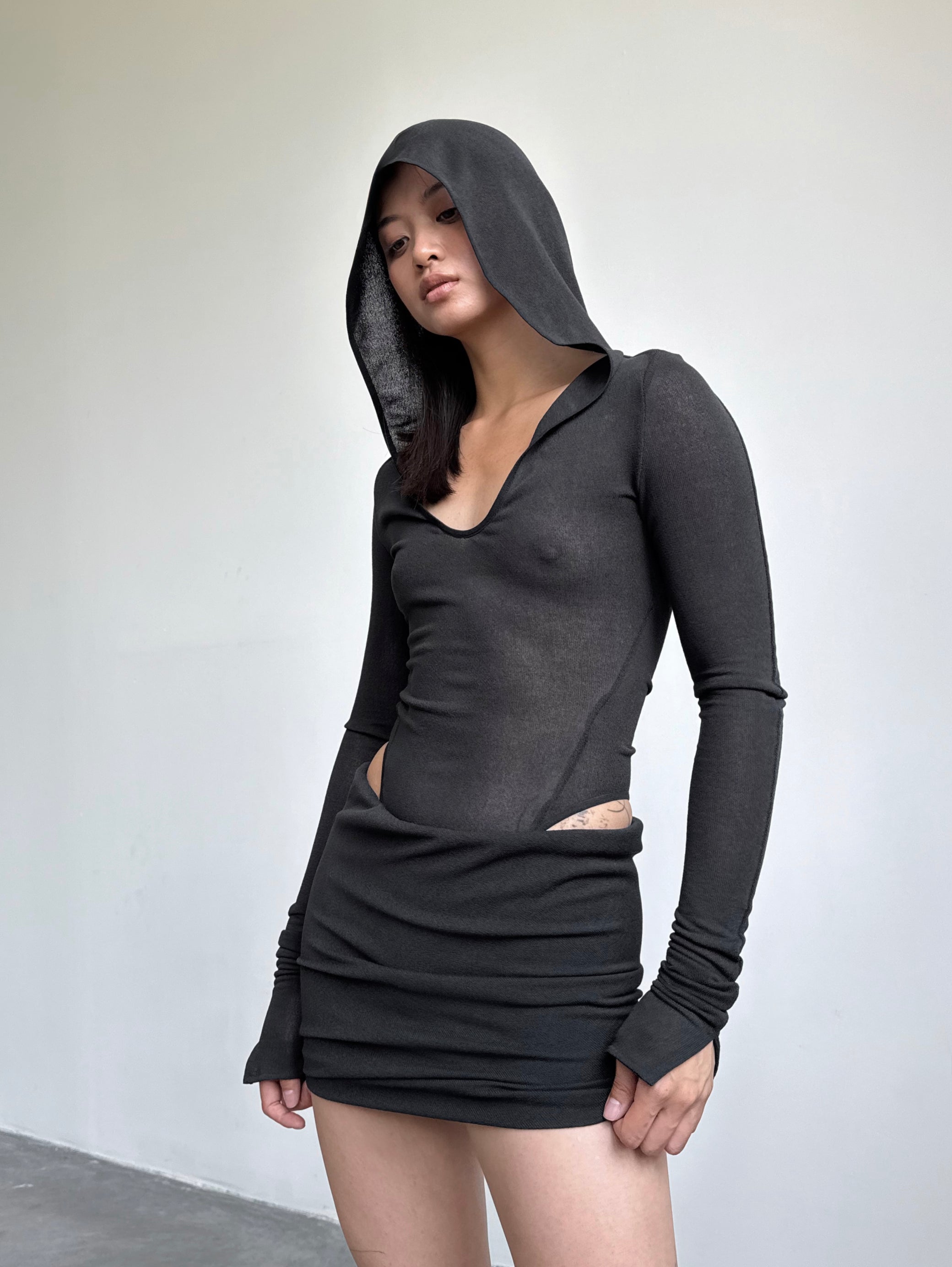 TWISTED MINI SKIRT IN BLACK